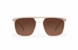 Image of Cheeterz Club eyewear. Photo of square sunglasses with brown tinted lenses. The frames are medium width with a navigator shape and a gold color, suitable for square, oval, and round face shapes. 