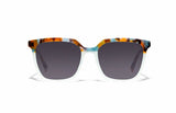 Image of Cheeterz Club eyewear. Photo of square sunglasses with gray tinted lenses. The frames are medium width with a multi print of a light aqua lower frame and a marble upper frame with colors of golden browns and various shares of aqua/ teal. Suitable for round, oval, and heart shaped face shapes. 