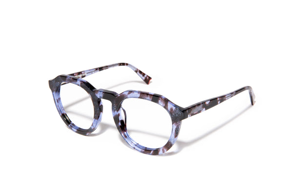 Image of Cheeterz Club eyewear. Photo of round eyeglasses with clear lenses and blue light blocking technology. The frames are medium width with glitter infused blue and black color and spotted print, suitable for square, oval, and oblong face shapes. These glasses can be used as reading glasses with blue light glasses.