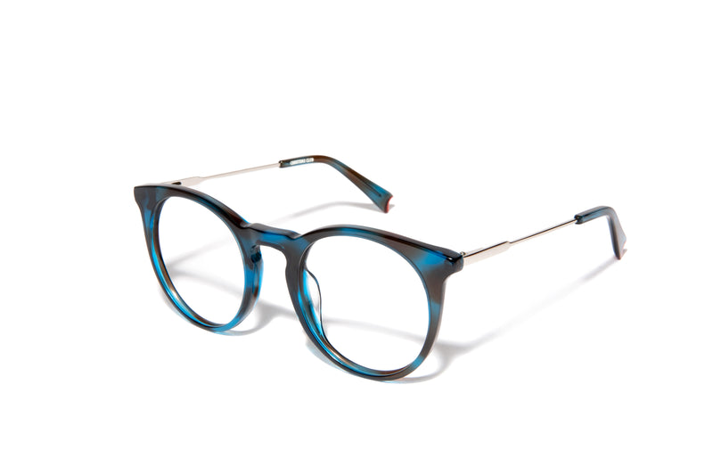Image of Cheeterz Club eyewear. Photo of retro classic round eyeglasses with clear lenses and blue light blocking technology. The frames are medium width and cobalt blue and black color with marble print. Suitable for square, oval, and oblong face shapes. These glasses can be used as reading glasses with blue light glasses.