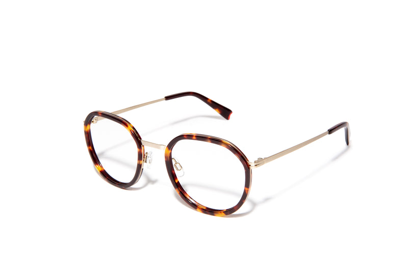 Image of Cheeterz Club eyewear. Photo of round eyeglasses with clear lenses and blue light blocking technology. The frames are small width and golden brown and mahogany color. Suitable for square, oval, and oblong face shapes. These glasses can be used as reading glasses with blue light glasses.