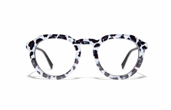 Image of Cheeterz Club eyewear. Photo of round eyeglasses with clear lenses and blue light blocking technology. The frames are medium width with white and black color and cheetah print, suitable for square, oval, and oblong face shapes. These glasses can be used as reading glasses with blue light glasses.