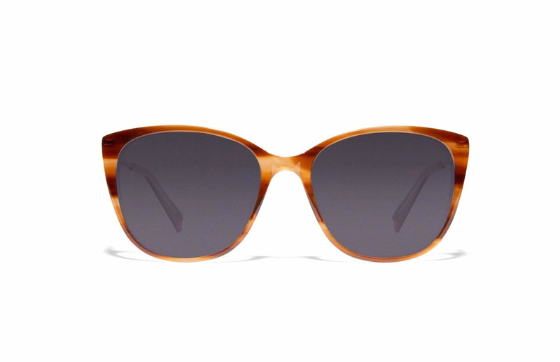 Image of Cheeterz Club eyewear. Photo of cat eye sunglasses with gray tinted lenses. The frames are small width with ginger orange and golden brown color, suitable for square, oval, and heart shaped face shapes. 