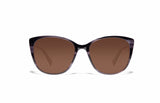 Image of Cheeterz Club eyewear. Photo of cat eye sunglasses with brown tinted lenses. The frames are small with smokey gray color and various shades of gray to accent, suitable for square, oval, and heart shaped face shapes. 