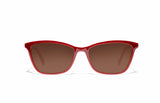 Image of Cheeterz Club eyewear. Photo of cat eye sunglasses with brown tinted lenses. The frames are medium width with red color. Suitable for round, oval, and heart shaped face shapes. 