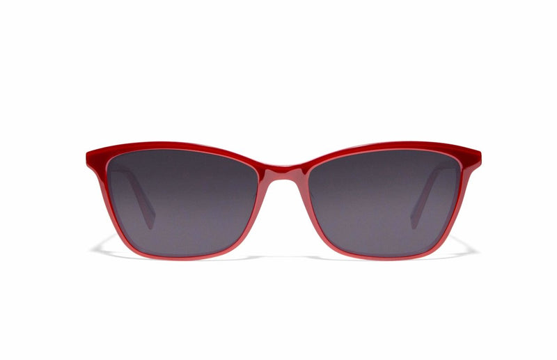 Image of Cheeterz Club eyewear. Photo of cat eye sunglasses with gray tinted lenses. The frames are medium width with red color. Suitable for round, oval, and heart shaped face shapes. 