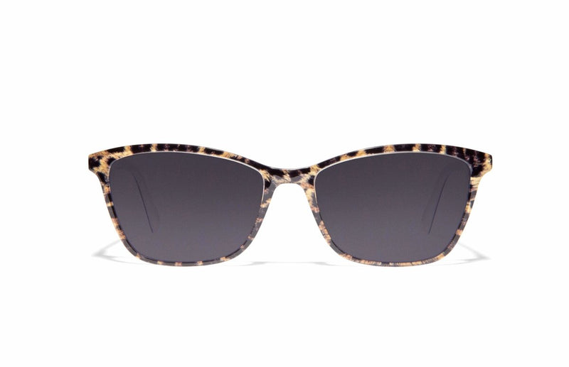 Image of Cheeterz Club eyewear. Photo of cat eye sunglasses with gray tinted lenses. The frames are medium width with cheetah print. Suitable for round, oval, and heart shaped face shapes.