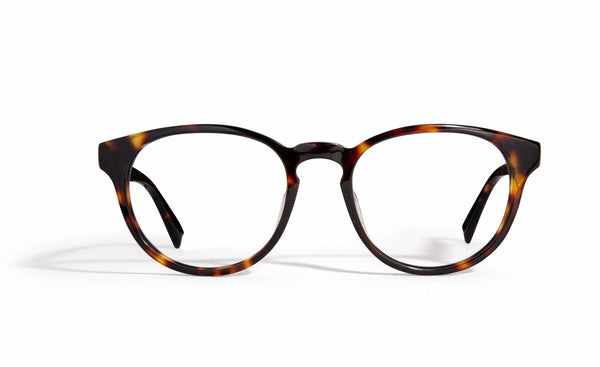 Image of Cheeterz Club eyewear. Photo of round eyeglasses with clear lenses and blue light blocking technology. The frames are medium width with black and golden brown color and marble print. Suitable for square, oval, and oblong face shapes. These glasses can be used as reading glasses with blue light glasses.