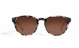 Image of Cheeterz Club eyewear. Photo of round sunglasses with brown tinted lenses. The frames are medium width with silver, white, and black color and marble print. Suitable for square, oval, and oblong face shapes. 