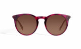 Image of Cheeterz Club eyewear. Photo of retro classic round sunglasses with brown tinted lenses. The frames are medium width and mulberry, brown, and purple color with marble print. Suitable for square, oval, and oblong shaped face shapes. 