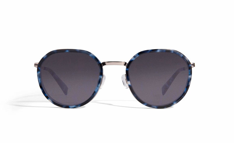 Image of Cheeterz Club eyewear. Photo of retro classic round sunglasses with gray tinted lenses. The frames are small width and blue, gray, and black color and a stainless steel frame front. Suitable for square, oval, and oblong shaped face shapes. 