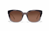 Image of Cheeterz Club eyewear. Photo of square sunglasses with brown tinted lenses.  The frames are wide width and custom laminated colors of black, gray, and silver with gray bottoms. Suitable for round, oval, and heart shaped face shapes. 