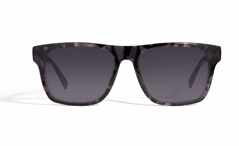 Image of Cheeterz Club eyewear. Photo of square sunglasses with gray tinted lenses. The frames are wide width with gray and black color.  Suitable for round, oval, and square face shapes. 